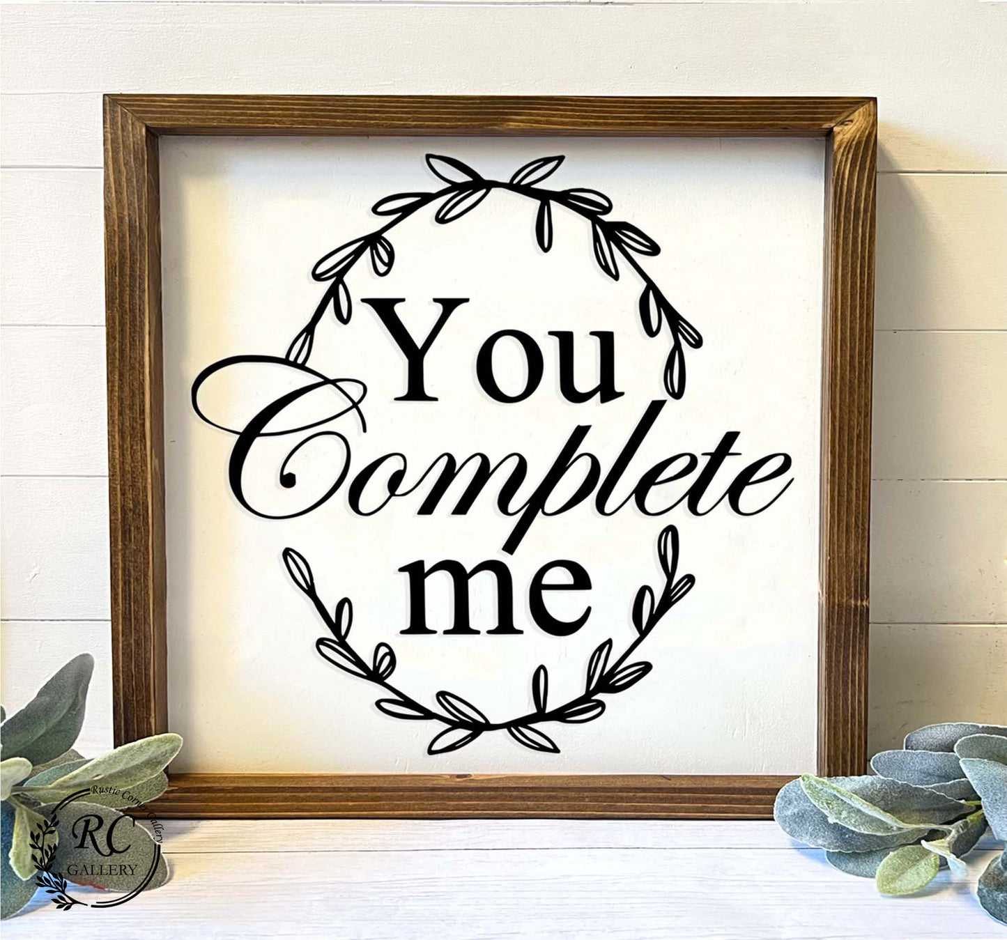 You complete me wood sign.